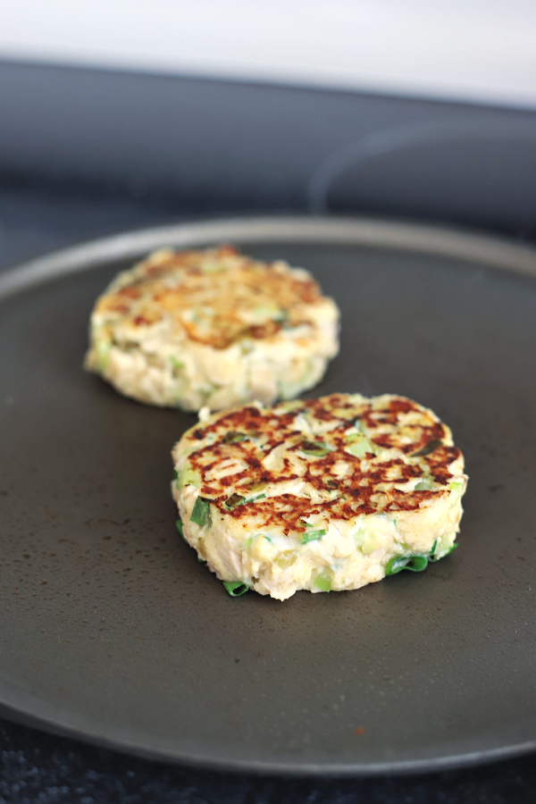 Grilling tuna melt patties for a classic tuna melt sandwich on a bun or English muffin.