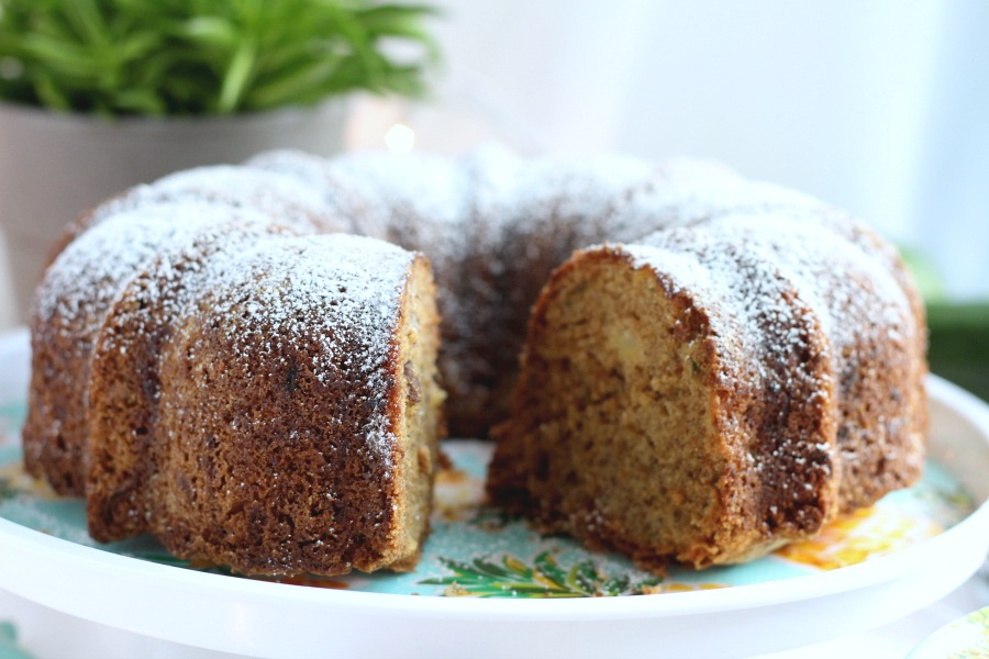 Easy, moist and delicious Zucchini Cake with pineapple and nuts is passed down from a vintage recipe. Made in a bundt pan and topped with glaze or 10X sugar