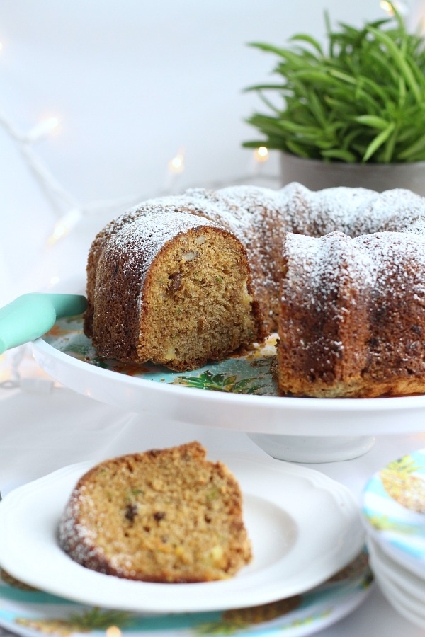 Easy, moist and delicious Zucchini Cake with pineapple and nuts is passed down from a vintage recipe. Made in a bundt pan and topped with glaze or 10X sugar