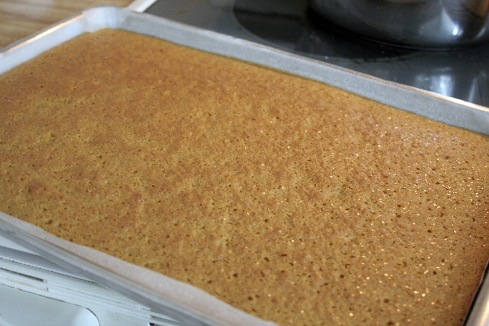 Famous and ever popular Pumpkin Roll. Sweet pumpkin cake with a rich cream cheese filling is a traditional Thanksgiving favorite on the dessert table.