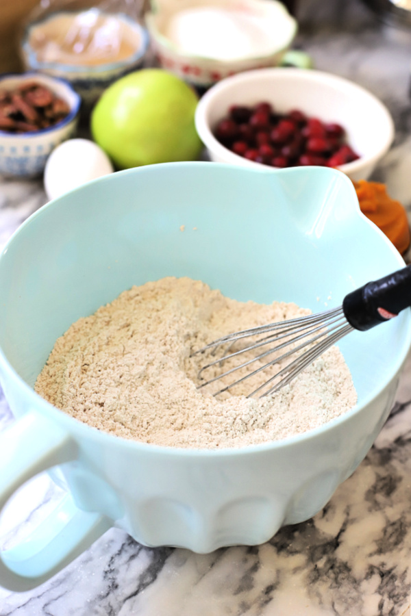 Whisking dry ingredients for all the flavors Thanksgiving Bundt cake