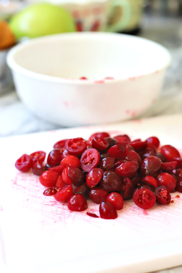 Chopping cranberries for all the flavors Thanksgiving Bundt cake