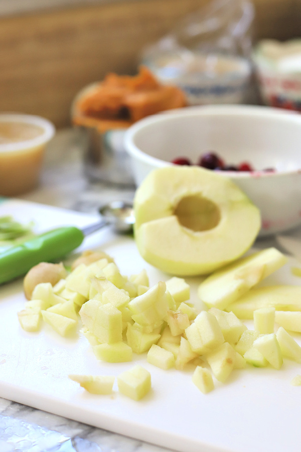 Chopping apples for all the flavors Thanksgiving Bundt cake