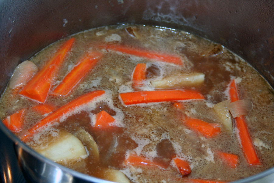 Easy, step-by-step recipe for old fashioned beef rump roast. Simmered slowly on the stovetop with carrots and potatoes until tender, it is a perfect family Sunday dinner.