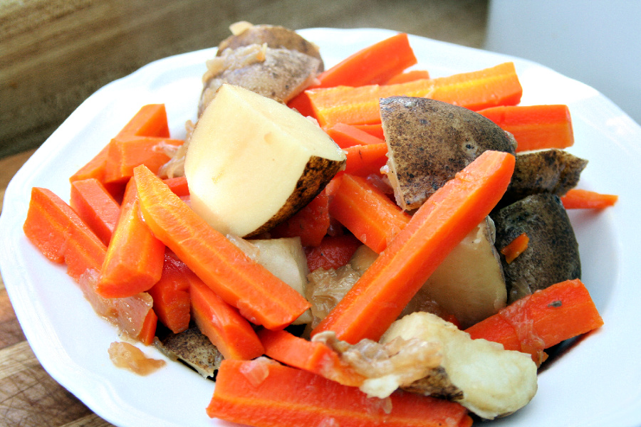 Easy, step-by-step recipe for old fashioned beef rump roast. Simmered slowly on the stovetop with carrots and potatoes until tender, it is a perfect family Sunday dinner.