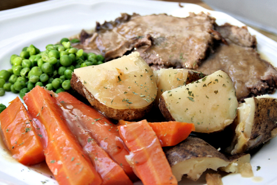 Easy, step-by-step recipe for old fashioned beef rump roast. Simmered slowly on the stovetop with carrots and potatoes until tender, it is a perfect family Sunday dinner.