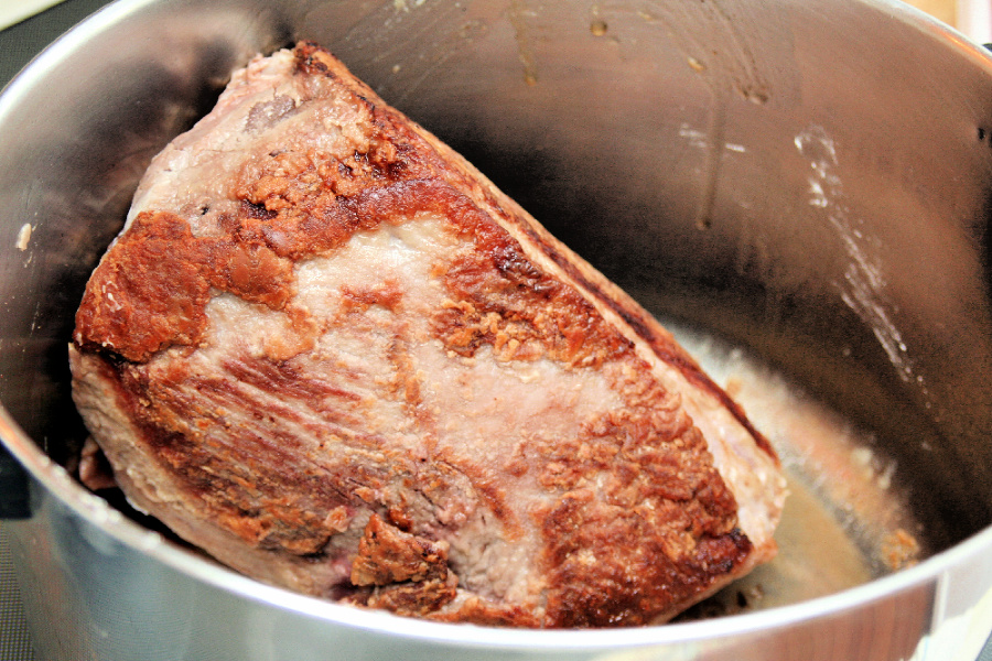 Easy, step-by-step recipe for old fashioned beef rump roast. Simmered slowly on the stovetop with carrots and potatoes until tender, it is a perfect family Sunday dinner.