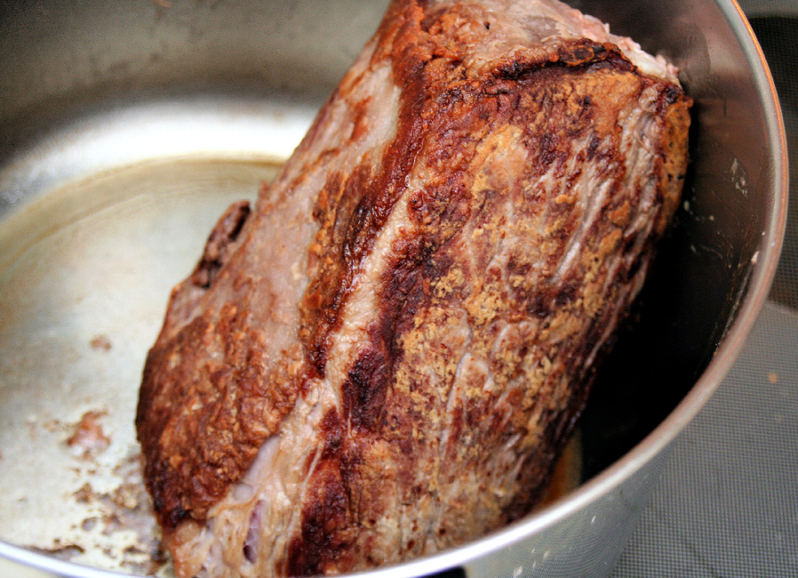 Easy, step-by-step recipe for old fashioned beef rump roast. Simmered slowly on the stovetop with carrots and potatoes until tender, it is a perfect family Sunday dinner.