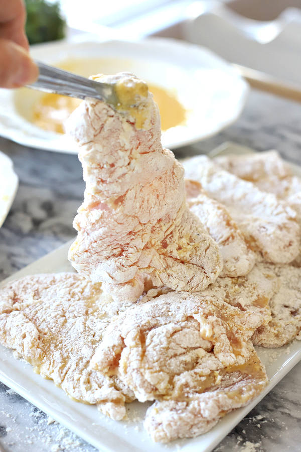 dredging chicken breasts for chicken francese.