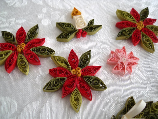 Paper quilling is a craft using thin strips of paper. Create flowers, tendrils and sweet little hearts to decorate and embellish all kinds of projects like this heart pendant.