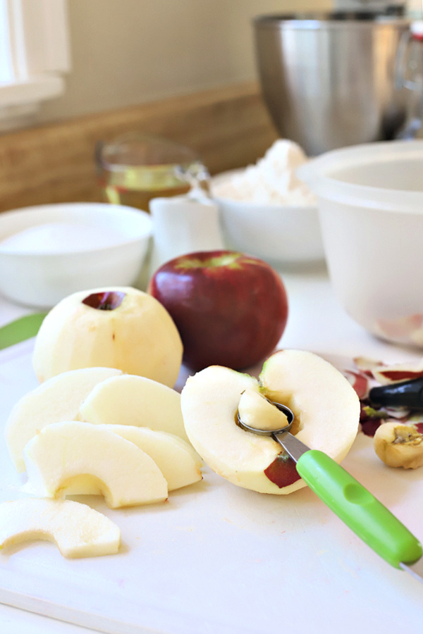 Peeling, coring and slicing apples for a Jewish apple cake