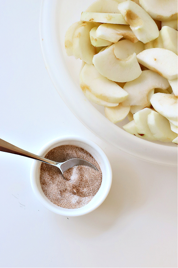 Cinnamon and sugar ready to sprinkle over sliced apples