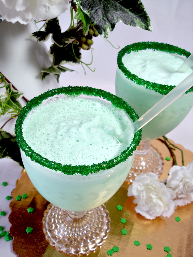 Frosty and minty, Shamrock Milkshake is similar to its fast-food version available each March for St Patrick's Day. Easy recipe to make you own using ice cream, milk, cream and mint for a delightful beverage treat. 