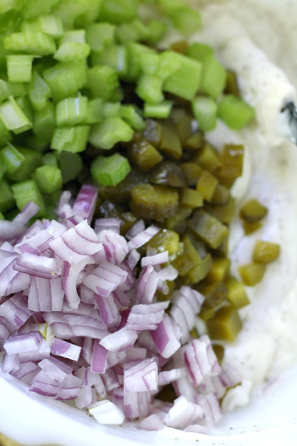 Vintage recipe for old-fashioned creamy potato salad is far from boring. Tons of flavor from sweet gherkin pickles, celery, onions & eggs. A classic barbecue favorite!