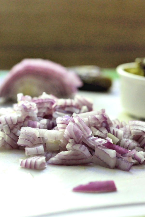 Vintage recipe for old-fashioned creamy potato salad is far from boring. Tons of flavor from sweet gherkin pickles, celery, onions & eggs. A classic barbecue favorite!