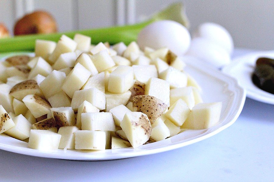 Vintage recipe for old-fashioned creamy potato salad is far from boring. Tons of flavor from sweet gherkin pickles, celery, onions & eggs. A classic barbecue favorite!