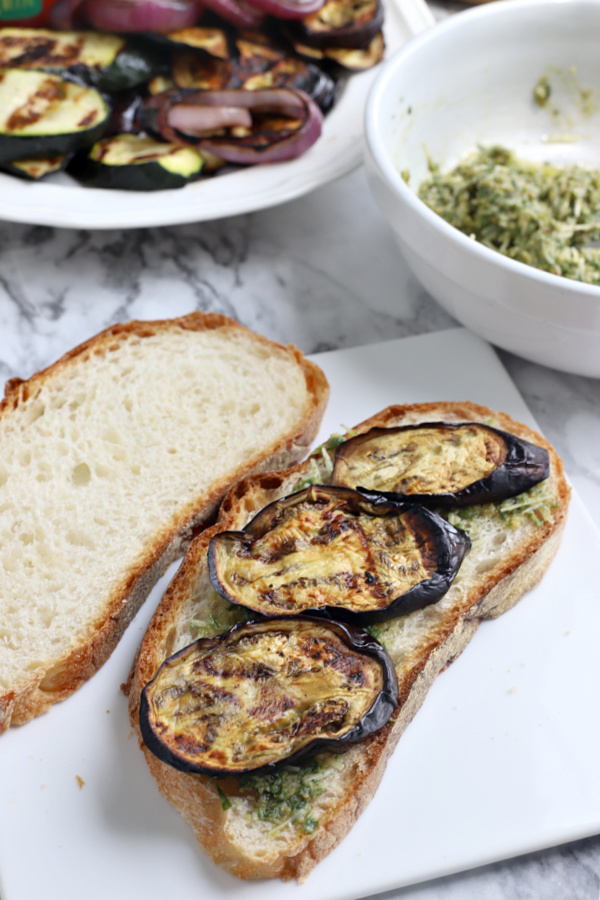 adding grilled eggplant