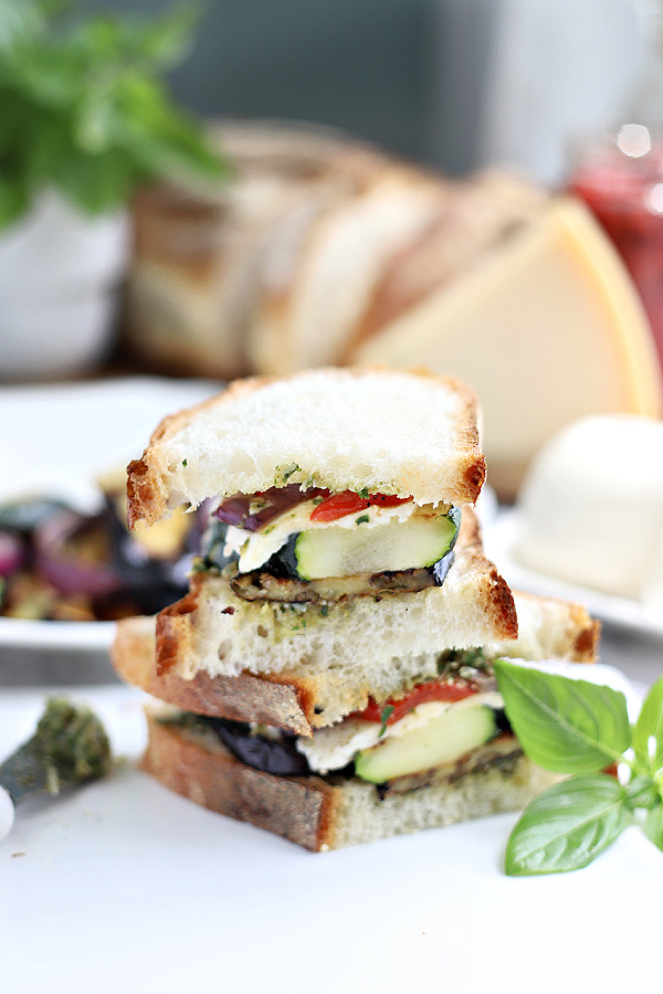 making a grilled eggplant zucchini vegetable panini sandwich