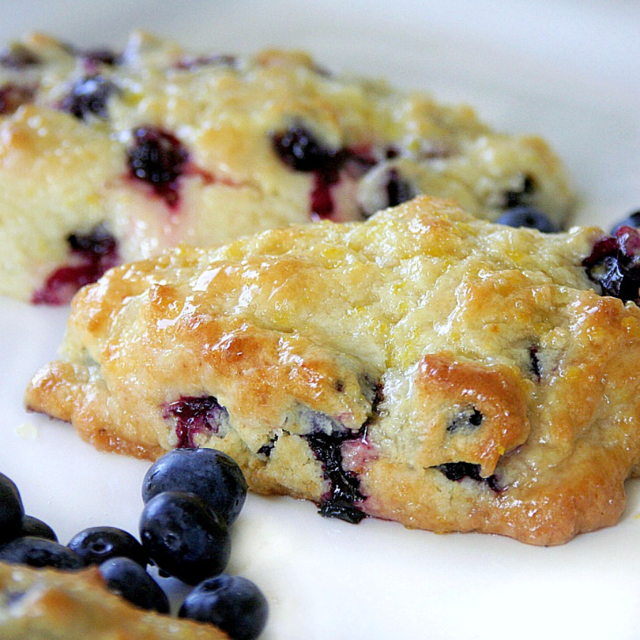 Sharing another blueberry treat ~ scones. These are wonderful blueberry scones from Tyler Florence and have a wonderful lemon glaze.