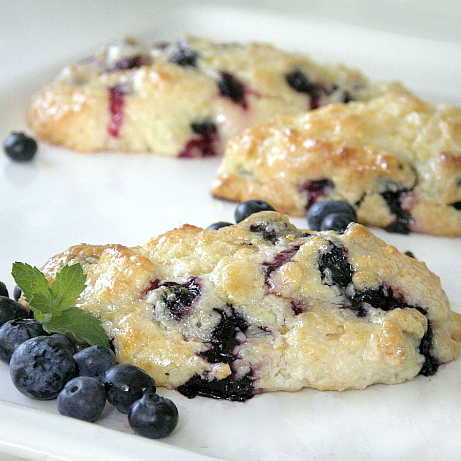 Sharing another blueberry treat ~ scones. These are wonderful blueberry scones from Tyler Florence and have a wonderful lemon glaze.