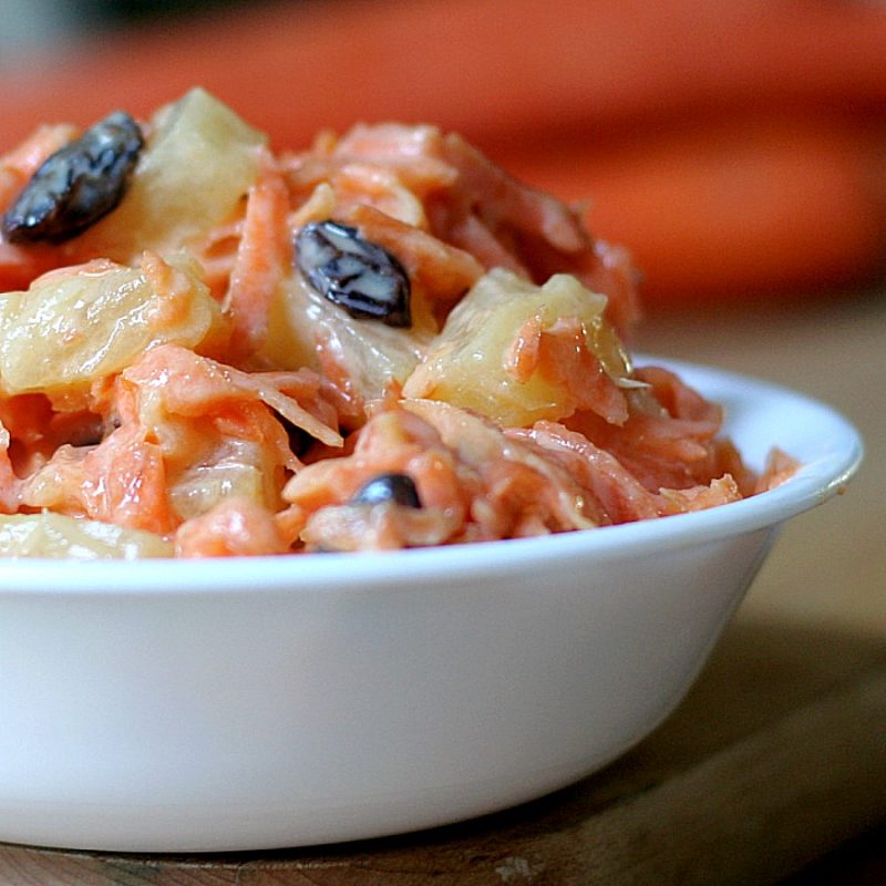 Recipe for crunchy carrot salad couldn't be easier. No cooking involved. Just a great side dish with the addition of sweet pineapple and raisins.