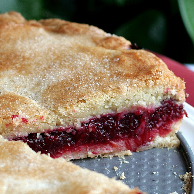 Try something new for Thanksgiving. Cranberry shortbread cake has a sweet and tart filling between two layers of shortbread dessert. A lovely addition to the dessert table.