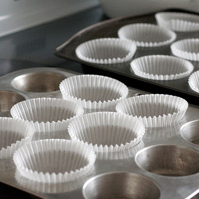 Moist and chocolaty, black bottom cups are rich little cupcakes with a cream cheese & chocolate chip filling and topped with sugar and pecans.