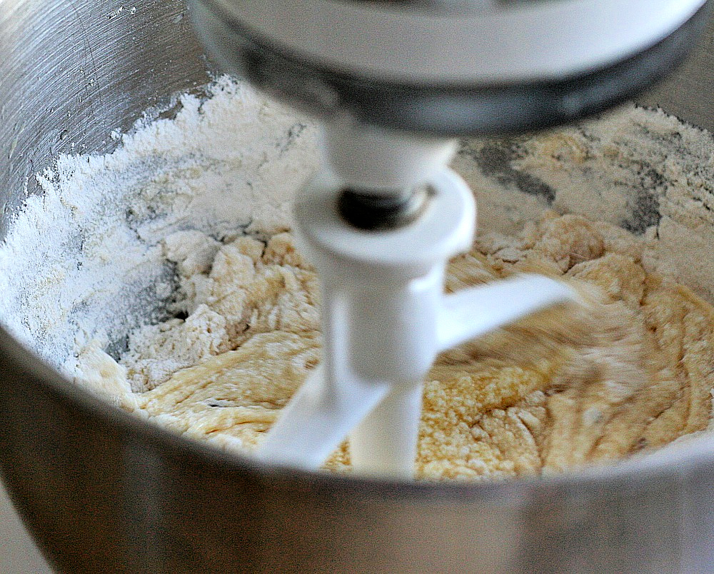 Easy recipe for crisp Italian pizzelles with anise seed made with a pizzelle maker. Perfect for your Christmas cookie tray or dessert table.