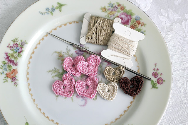 Quick and easy, tiny crocheted hearts can be used to embellish crafts and greeting cards for Valentine's Day, Mother's Day and Birthday gifts