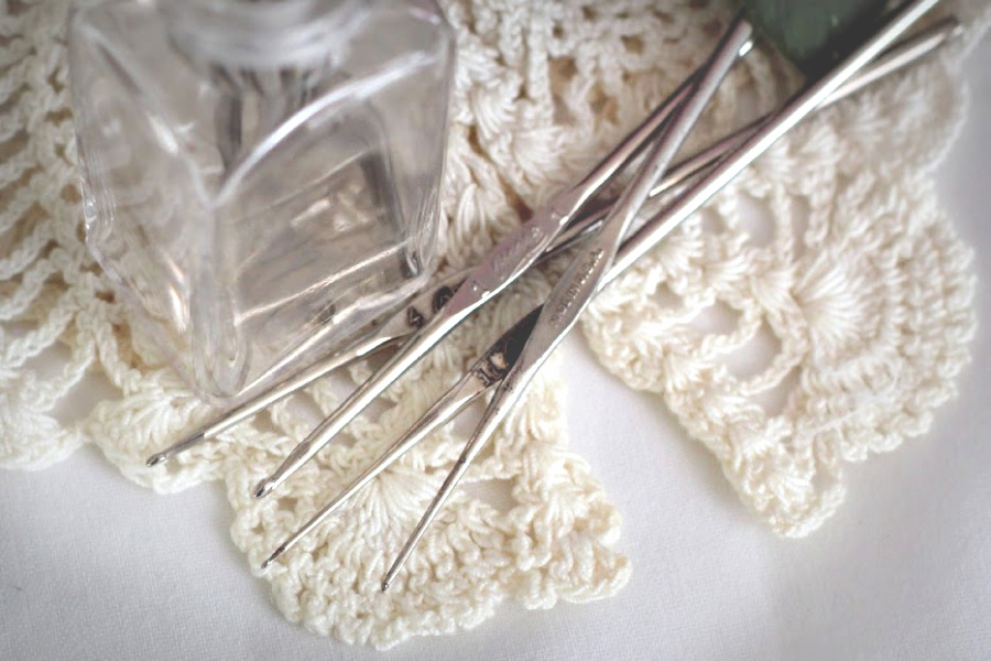 Tiny vintage crochet hooks grandmother used to make doilies, hankies, bonnets and sweaters.