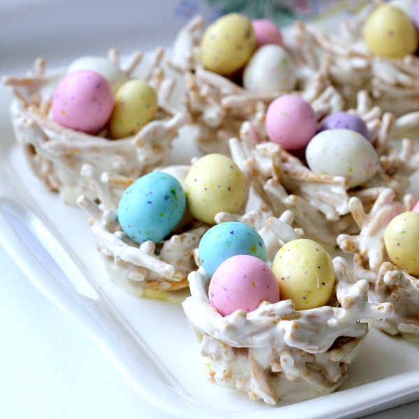 Cute, edible Easter springtime bird nests are adorable for Easter. Pretty pastel candy eggs nestled in twig-like bundles make a lovely welcome to dinner guests. They are made using Chow Mein noodles giving the appearance of sticks gathered by the birds to construct their nests.