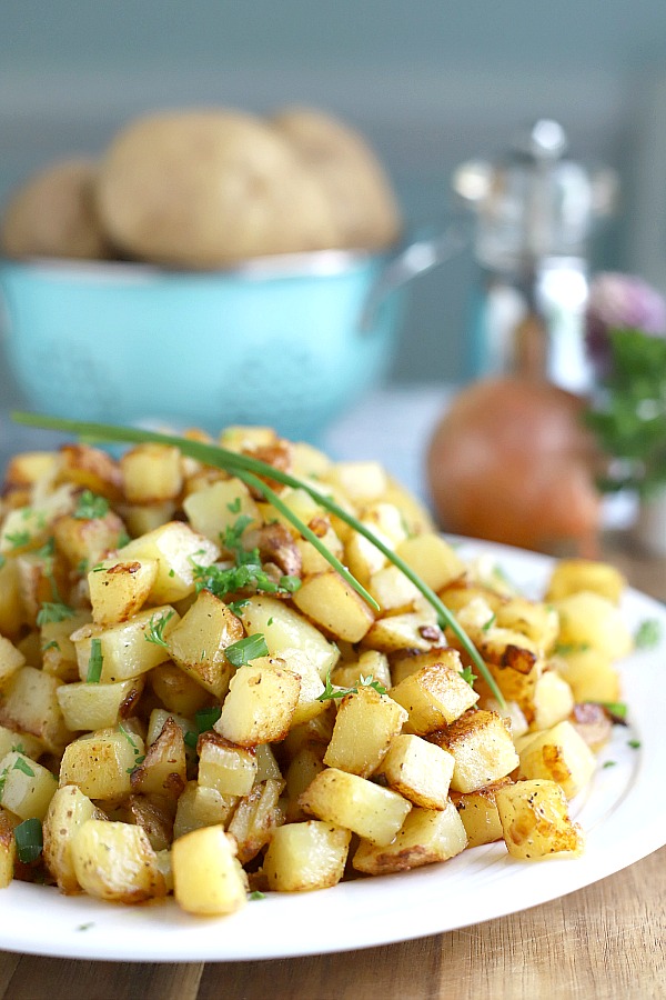 Easy recipe for homemade hashed browns. Diced potatoes are cooked in butter to perfection with a crispy exterior and great potato flavor. Great with eggs and bacon for breakfast or as a dinner side dish.