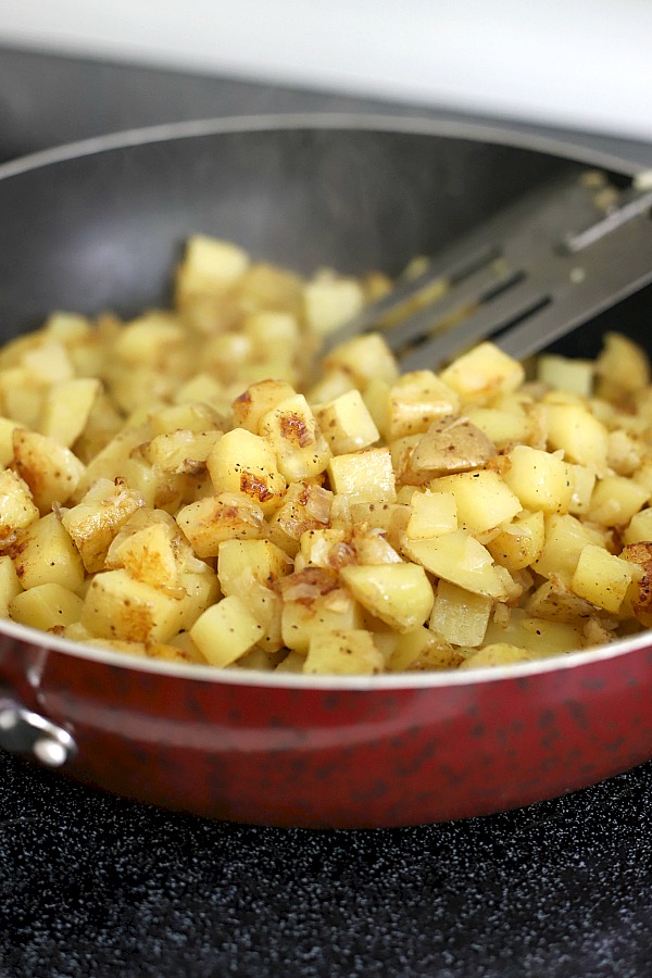 Easy recipe for homemade hashed browns. Diced potatoes are cooked in butter to perfection with a crispy exterior and great potato flavor. Great with eggs and bacon for breakfast or as a dinner side dish.