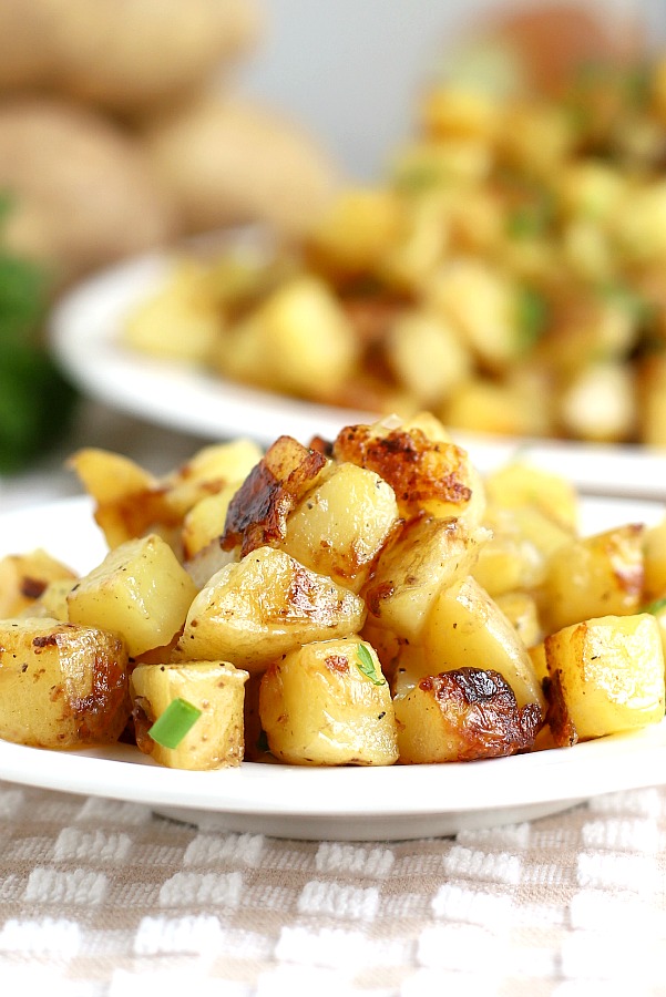 An easy recipe for homemade hashed browns from buttery potato cubes cooked until the exterior is crispy and the center is tender. So right with breakfast eggs and bacon or as a dinner side.