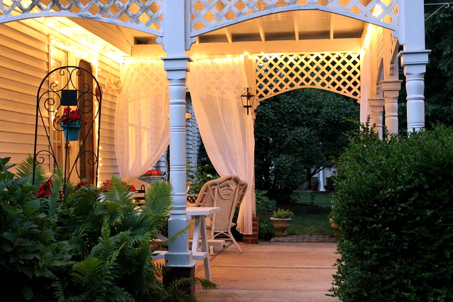 Create an inviting ambiance for dining and entertaining with an easy up-cycling DIY. Re-purposed Curtains for the Patio look lovely and romantic.