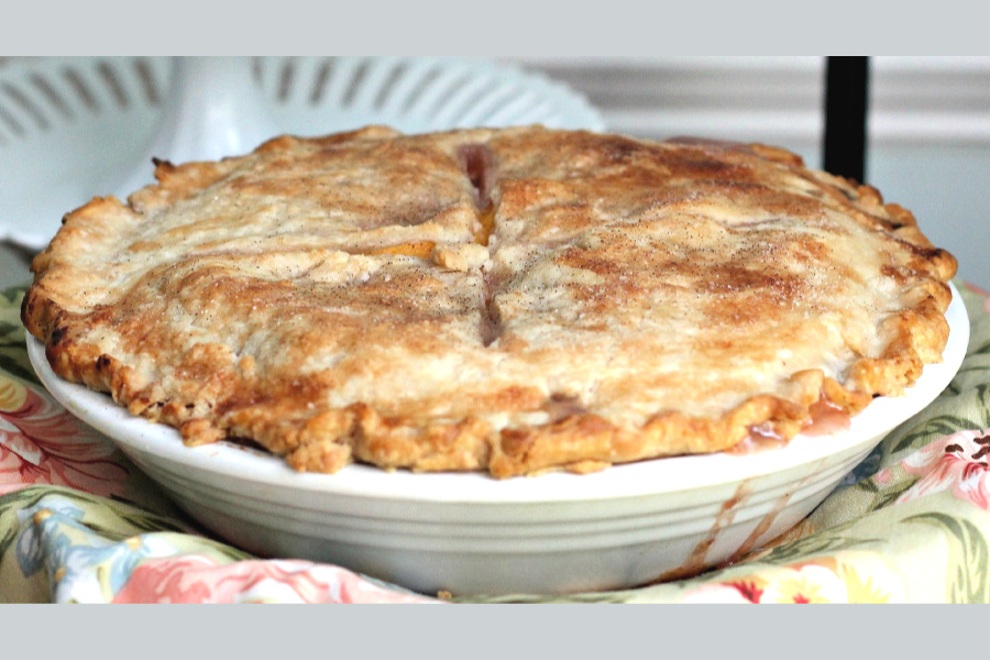 Use a purchased or homemade pastry crust to make a summer time favorite. Easy recipe for a fresh peach pie.