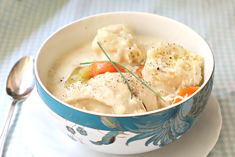 Bowl of tender chicken and dumplings.