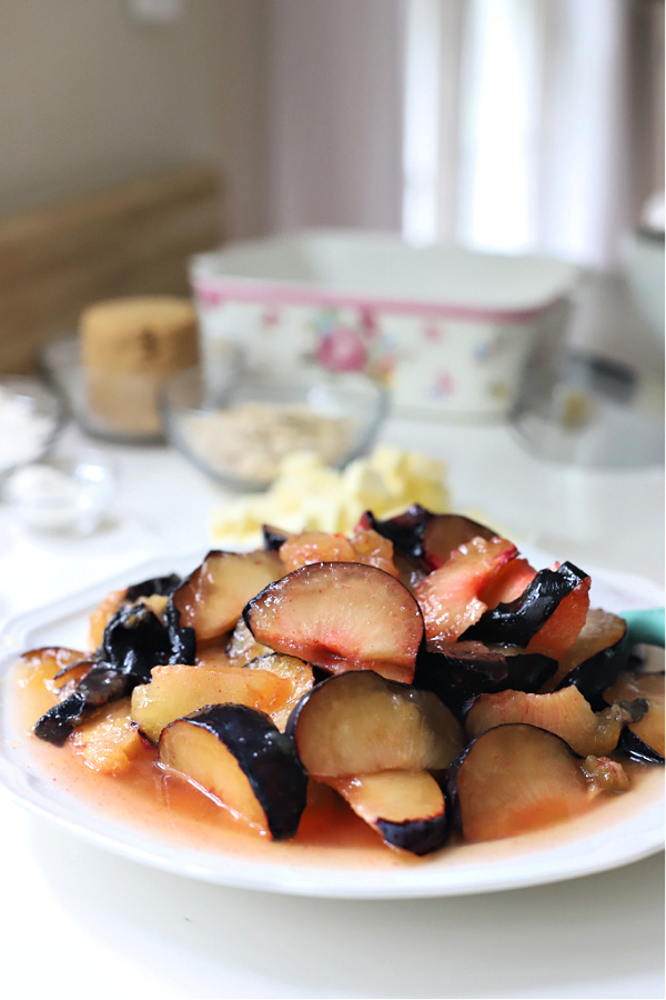 Cutting the plums for a crisp recipe