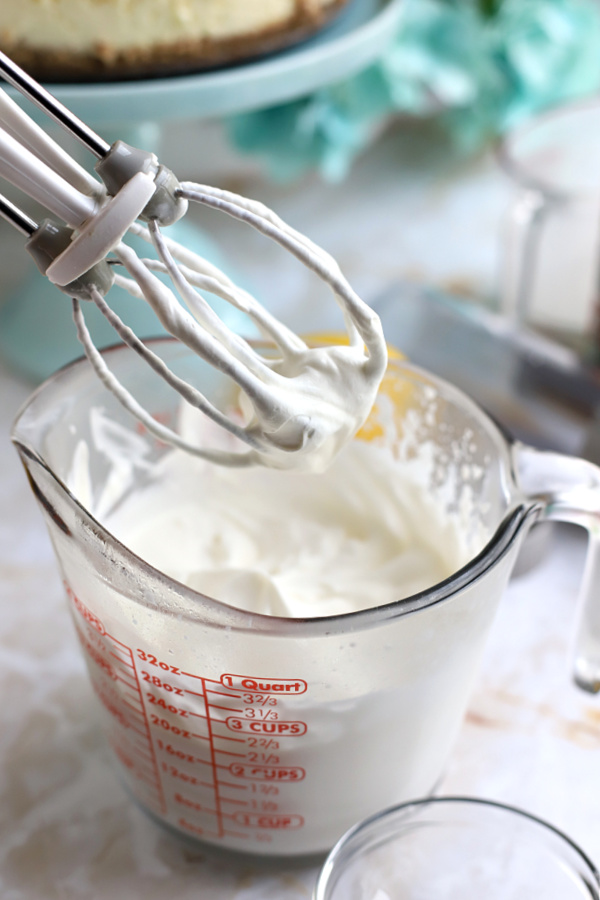 Easy how-to for making homemade whipped cream for triple lemon cheesecake.