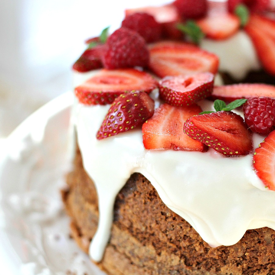 Cream Cheese Pound Cake is a showstopper dessert that is moist and delicious. Serve plain or dress it up with snowy white frosting and top with strawberries.