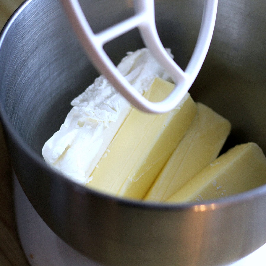 Cream Cheese Pound Cake is a showstopper dessert that is moist and delicious. Serve plain or dress it up with snowy white frosting and top with strawberries.