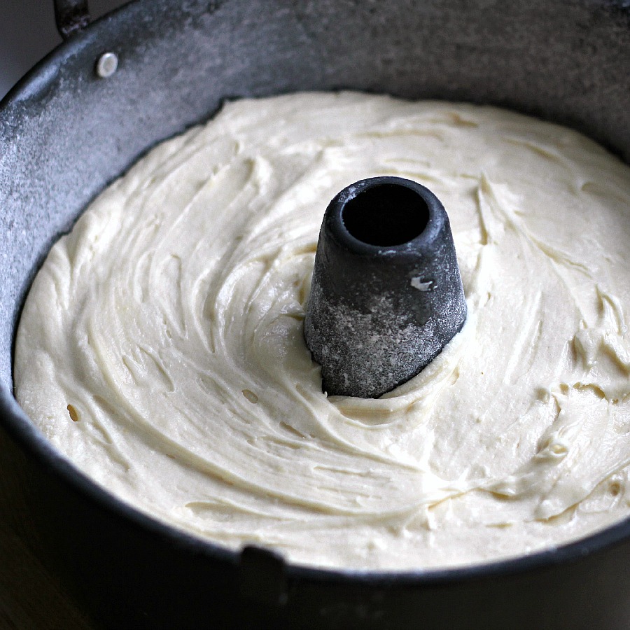 Cream Cheese Pound Cake is a showstopper dessert that is moist and delicious. Serve plain or dress it up with snowy white frosting and top with strawberries.