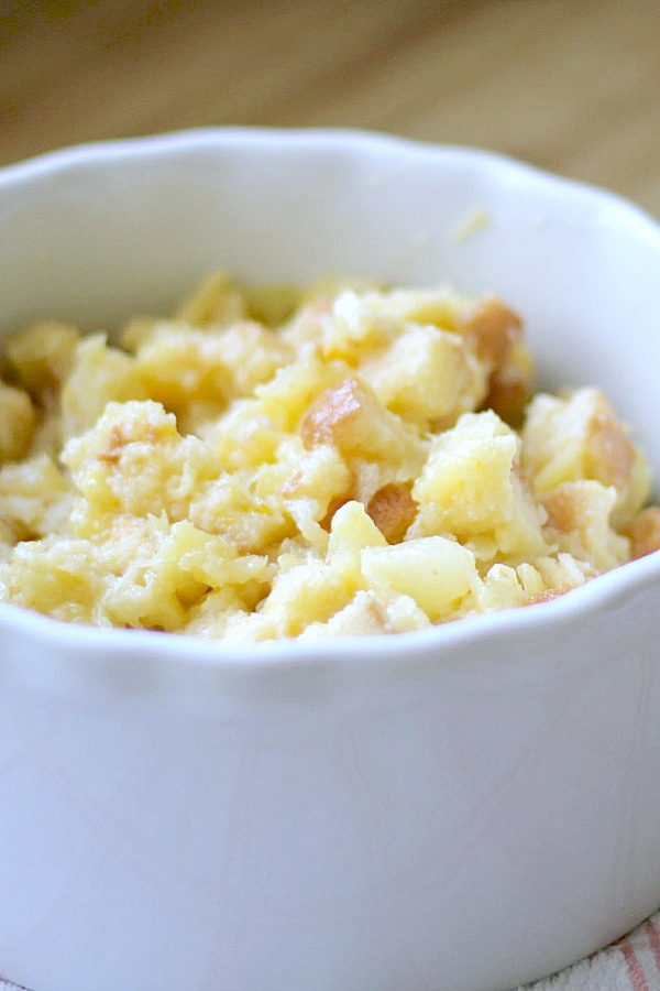 Pineapple spoonbread, also called pineapple casserole or soufflé is the perfect side dish for baked ham for Easter or holiday dinner. It is so easy, made with bread cubes, butter and crushed pineapple.