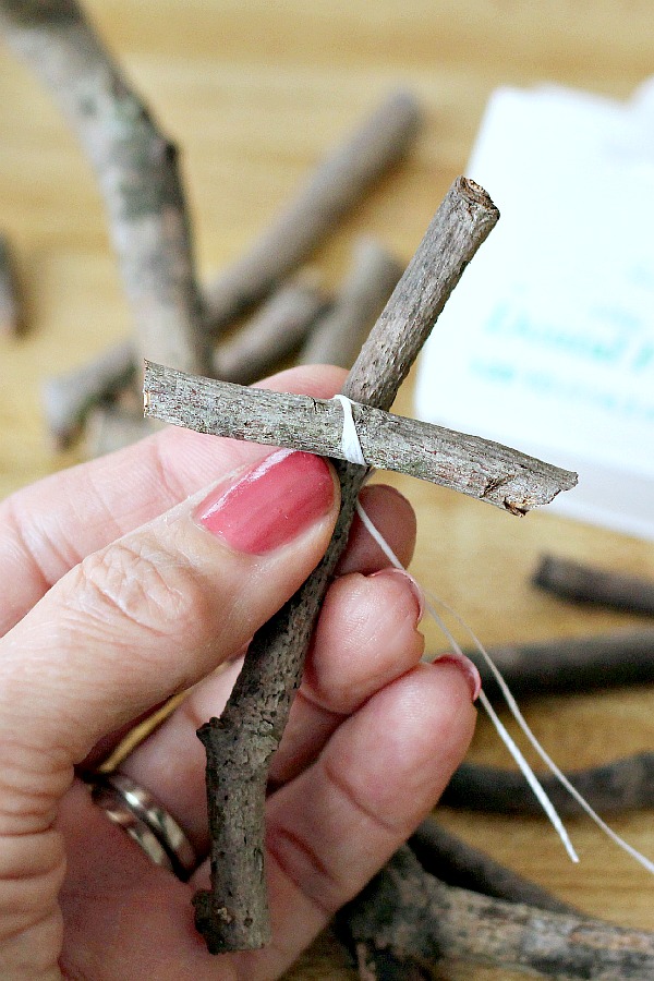 Make a humble little wooden cross from sticks gathered from your yard. Attach a tag with the bible verse from Luke 2:11, "a Savior has been born to you", as you celebrate Easter or Christmas. These little stick crosses are a sweet and easy holiday craft to make for or with kids.