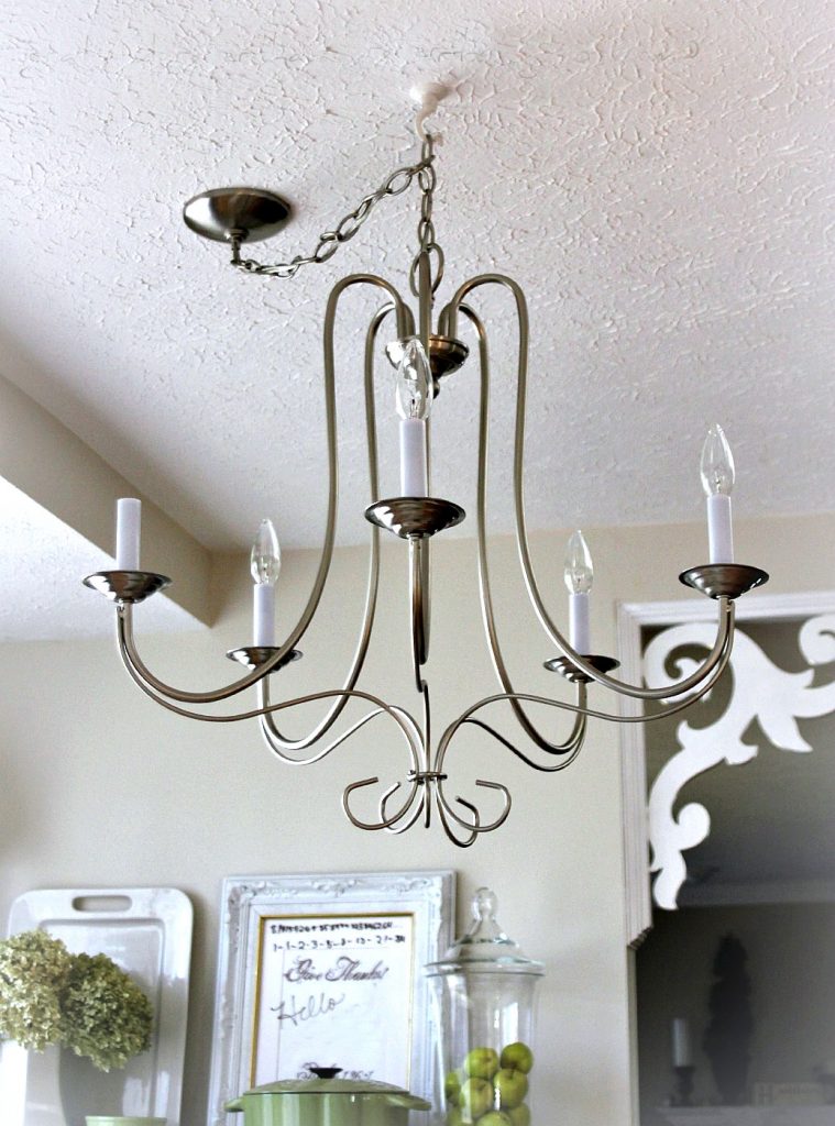 Don't trash those globes from the chandelier you just replaced. Up-cycle them into the cutest flower pots by simple re-purposing.