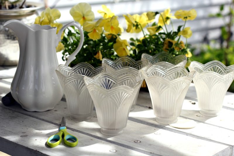 Don't trash those globes from the chandelier you just replaced. Up-cycle them into the cutest flower pots by simple re-purposing.