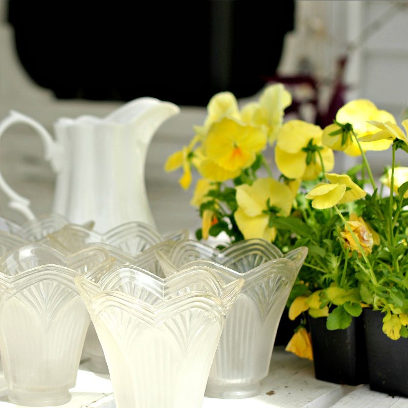 Don't trash those globes from the chandelier you just replaced. Up-cycle them into the cutest flower pots by simple re-purposing.