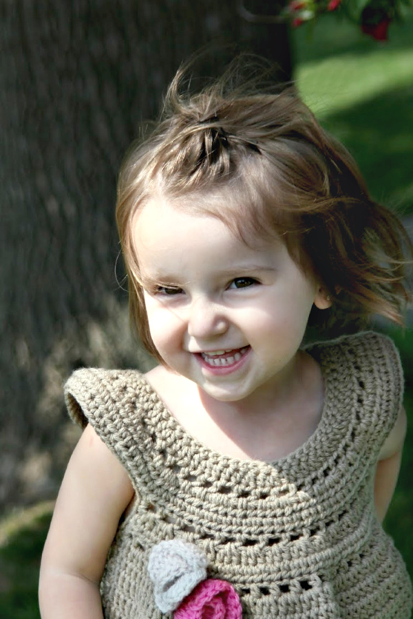 Sweet crochet top or dress for little girls from La La Lovely pattern. Easy Etsy pattern for an adorable outfit for kids clothing.