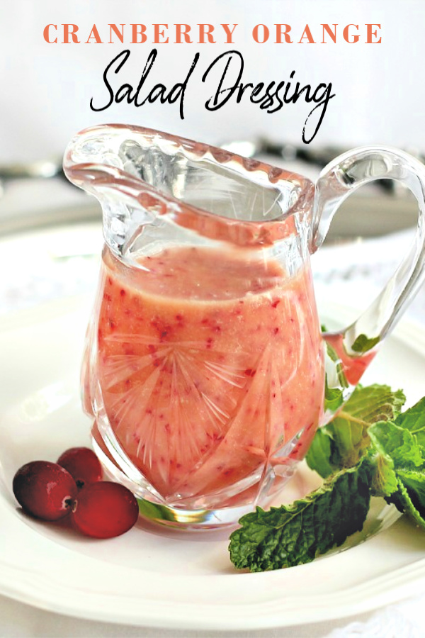 Cranberry orange salad dressing adds a bright citrus taste with little flecks of cranberry throughout a creamy vinaigrette.