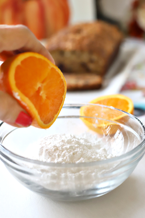 Making the citrus glaze for coconut banana quick bread.